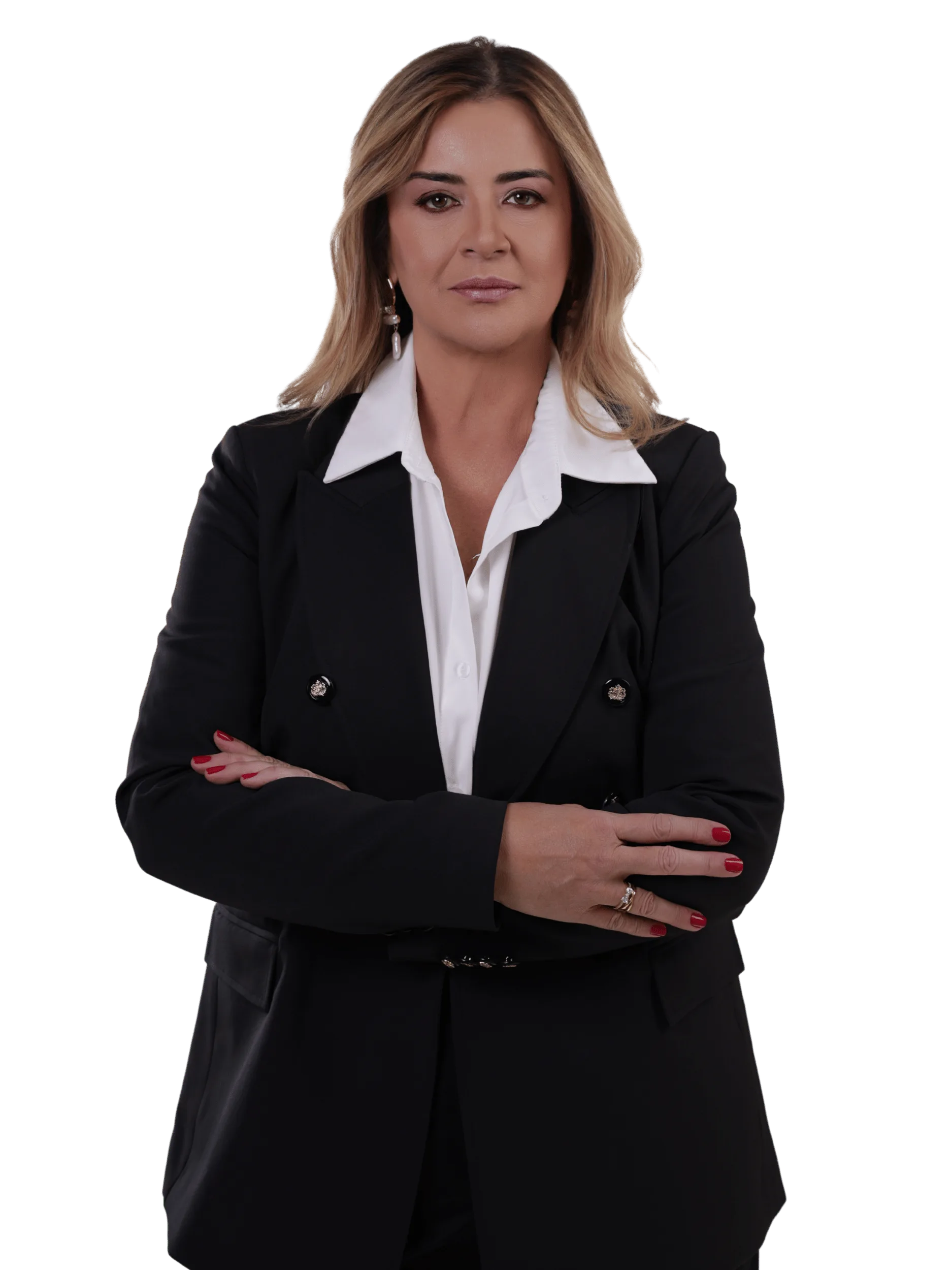 Val Justo com blazer lilás, sorrindo de braços cruzados